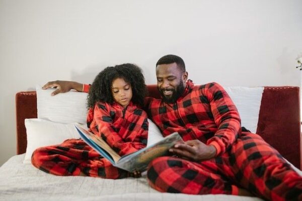 Bitney Adventures - African American Father Reading to Child - Pexels