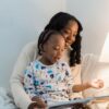 Bitney Adventures - African American Mother Reading to Child - Pexels