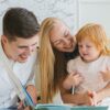 Bitney Adventures - Parents Reading to Child - Pexels