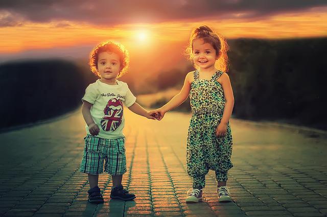 The Children's Newsletter by Bitney - Children Holding Hands in the Sunset - Pixabay