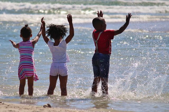 The Children's Newsletter by Bitney - African Children Playing in Water Outside - Pixabay