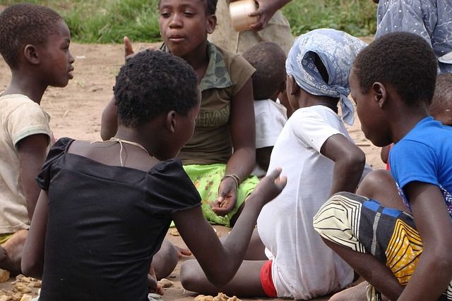 The Children's Newsletter by Bitney - African Children Sitting in Circle Outside - Pixabay