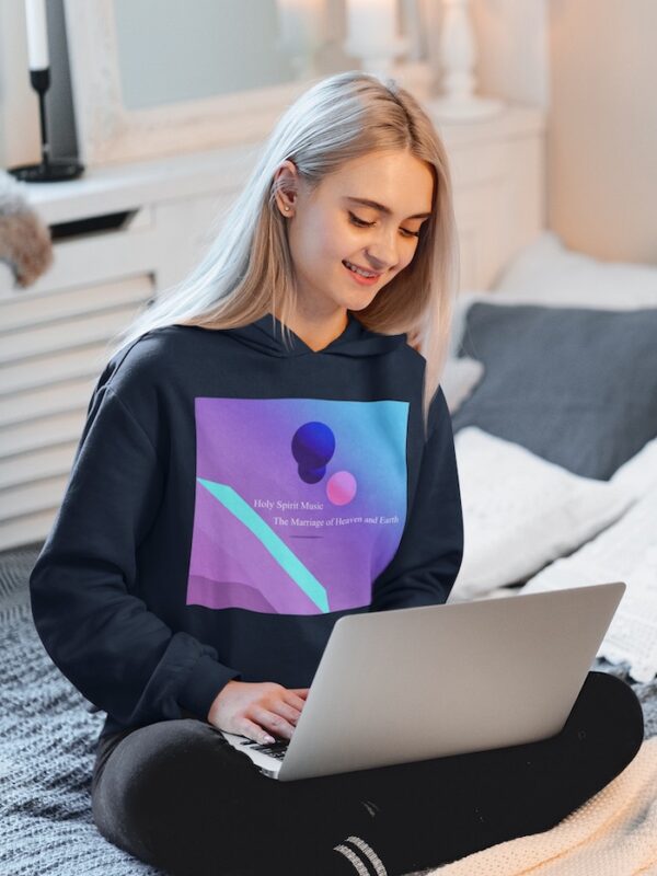 Bitney Adventures - Holy Spirit Music – The Marriage of Heaven and Earth Premium Hoodie With Text - Woman Sitting Using Laptop Wearing Hoodie - Navy Blazer