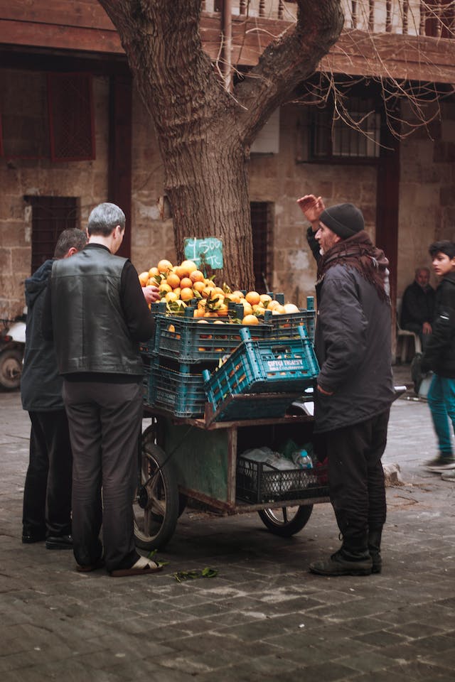 The Children's Newsletter by Bitney - Male Selling Fruits and Vegetables at a Farm Stand - Pexels