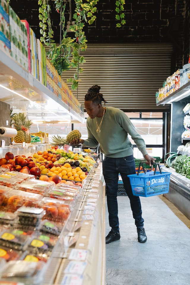 The Children's Newsletter by Bitney - Man Buying Fruits at a Grocery Store - Pexels